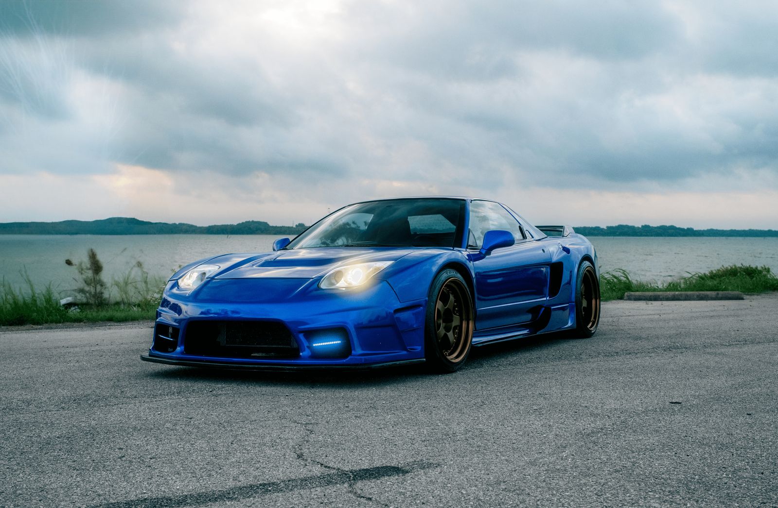 Front three-quarter view of the blue widebody 1992 Acura NSX