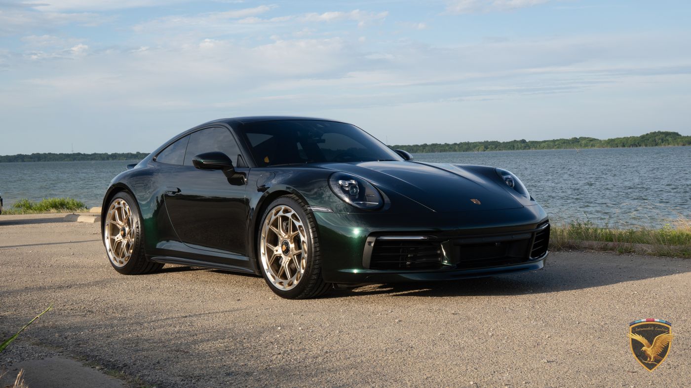 Front three-quarter view of the 911 Carrera T by the water